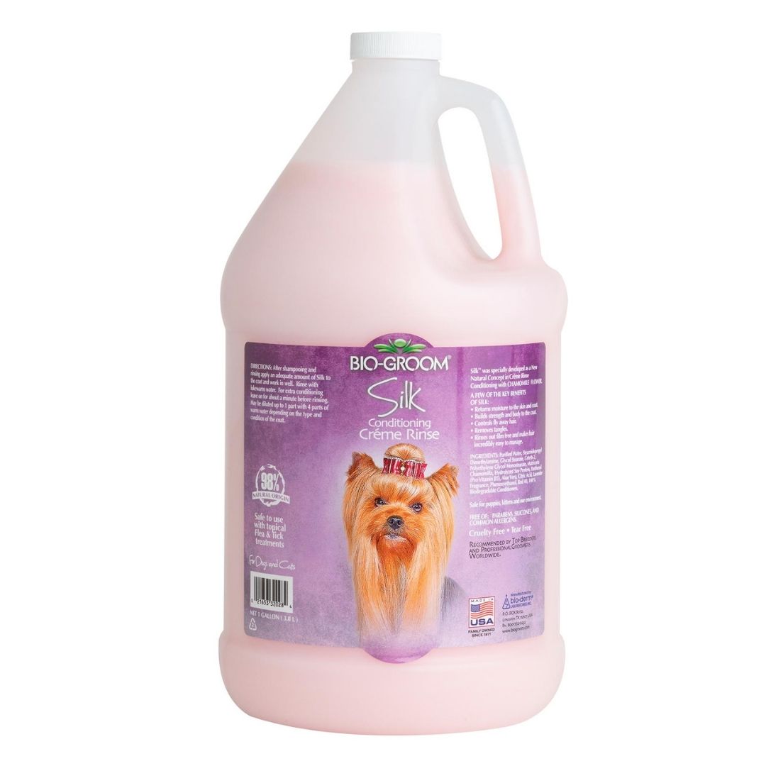 Bio-Groom Silk conditioning creme rinse 1-gal bottle with pink liquid and purple label