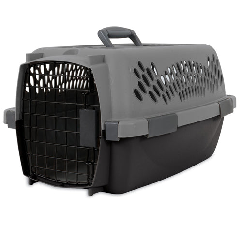 Light gray hard plastic dog kennel carrier with ventilated side and front door