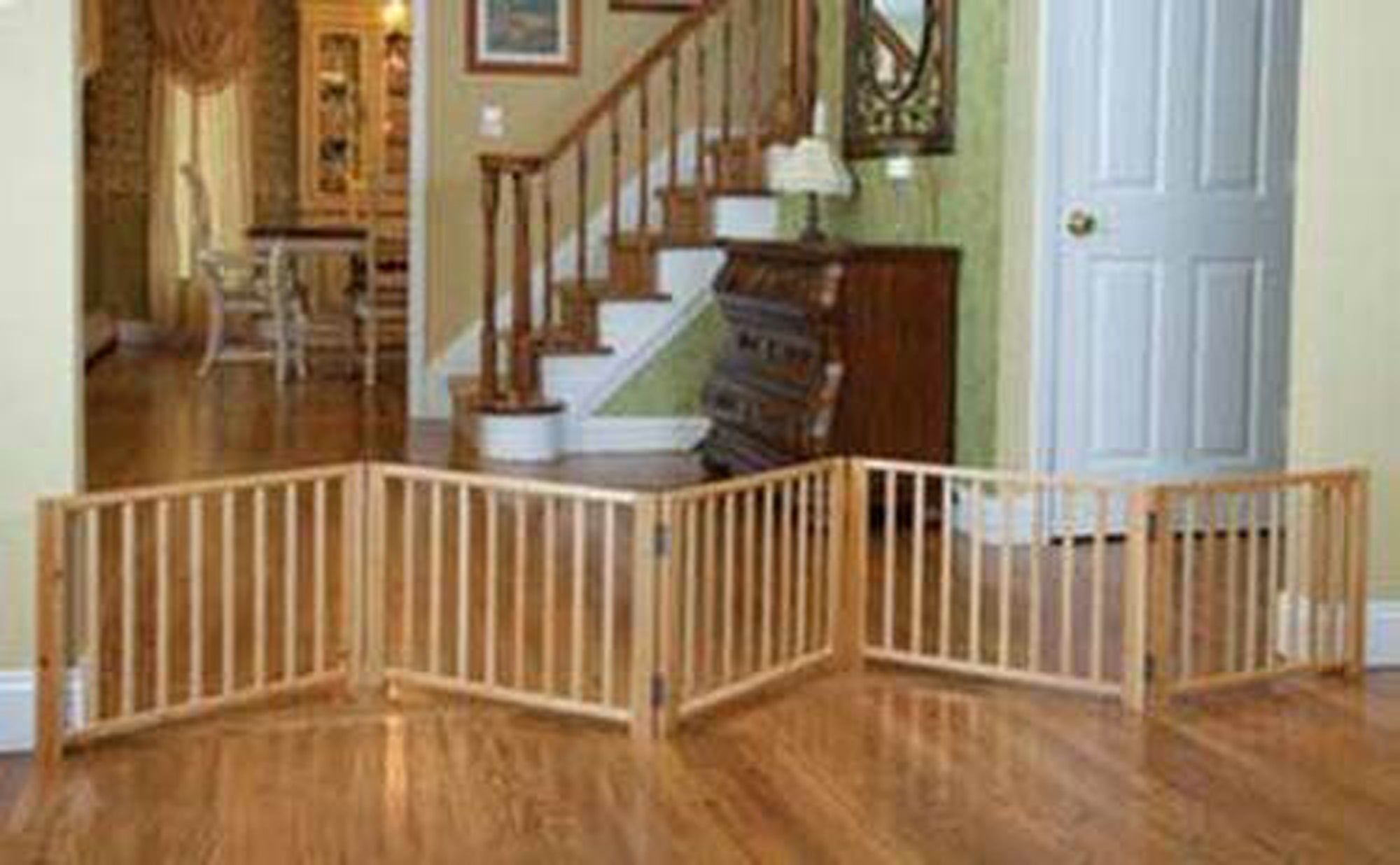 Wood expandable dog gate with vertical slats, three-panel hinged frame, for doorways
