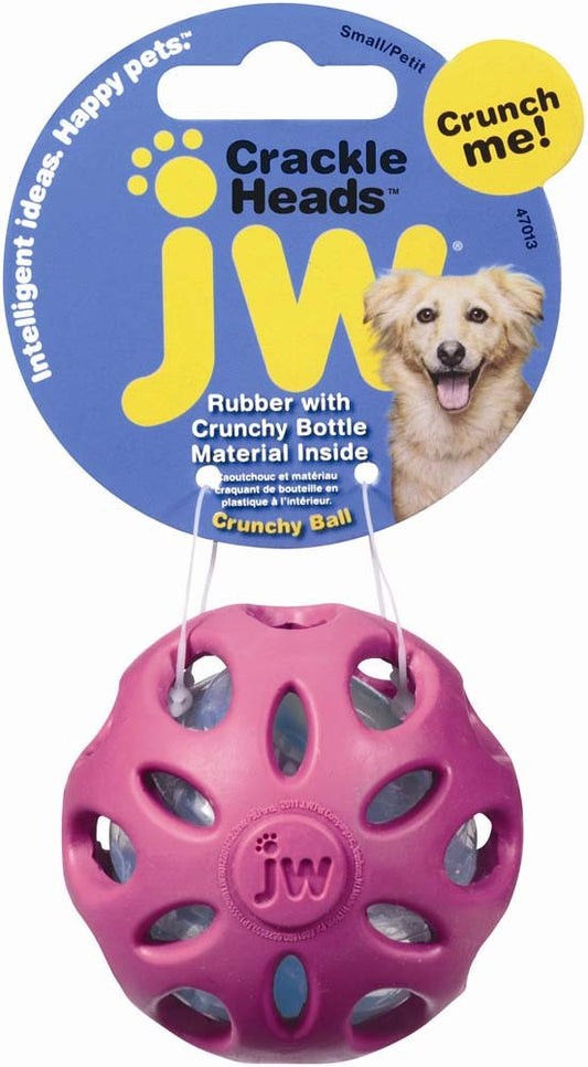 Small rubber crackle dog ball toy, pink-purple with JW logo and textured holes.
