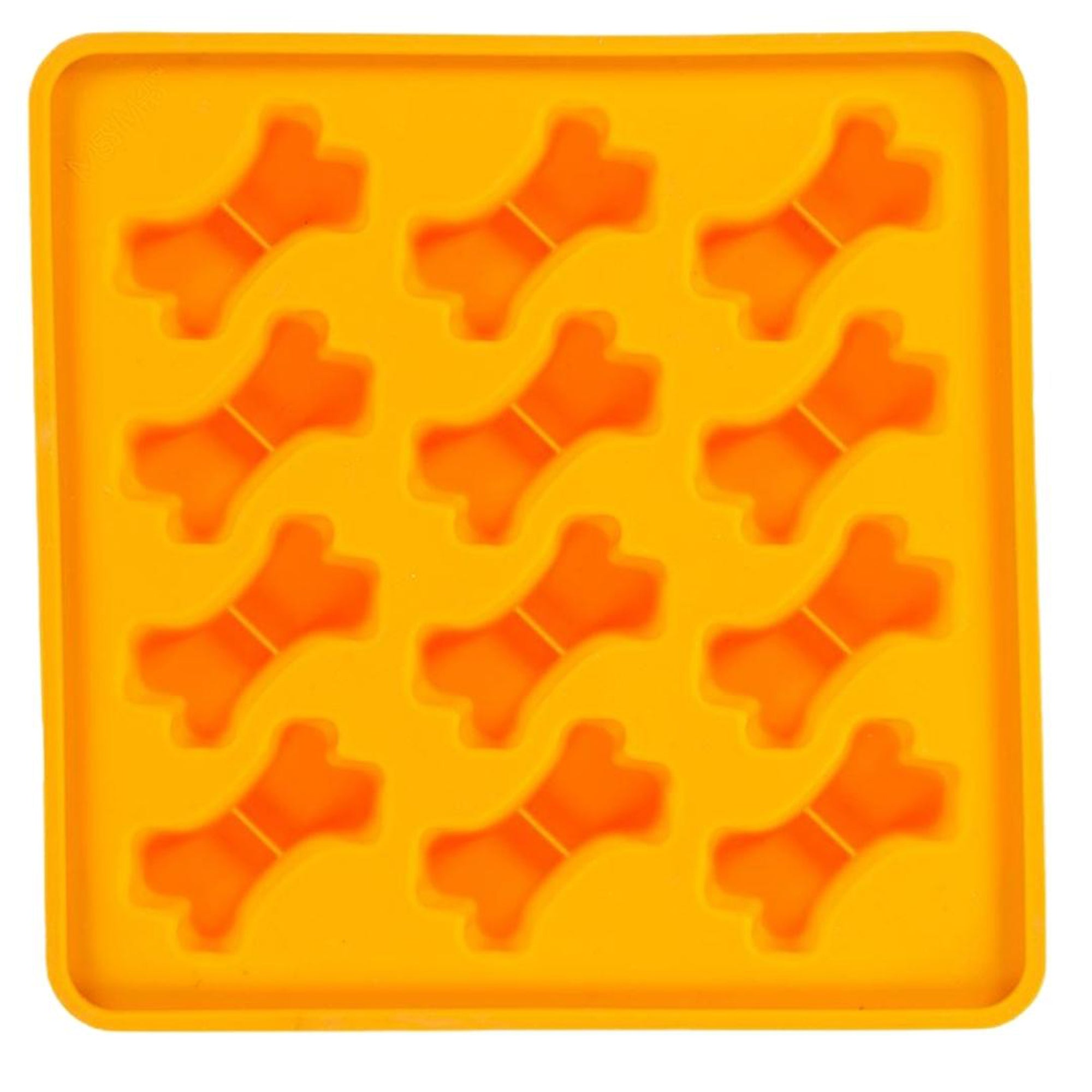 Orange silicone dog treat mold tray with bone-shaped cavities and raised frame