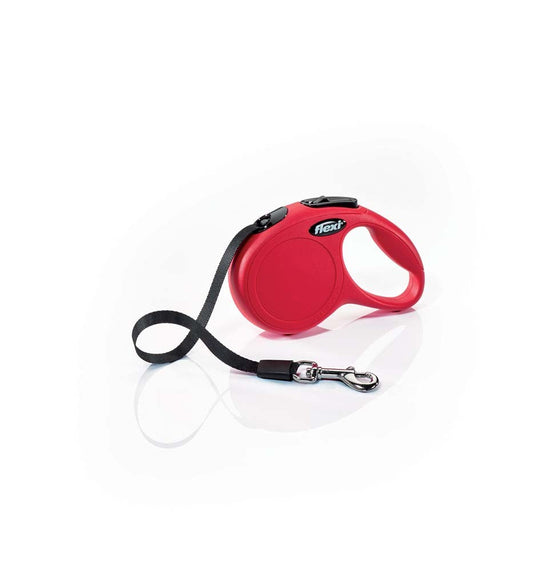 Red retractable dog tape lead with black handle, wrist strap, and metal clip