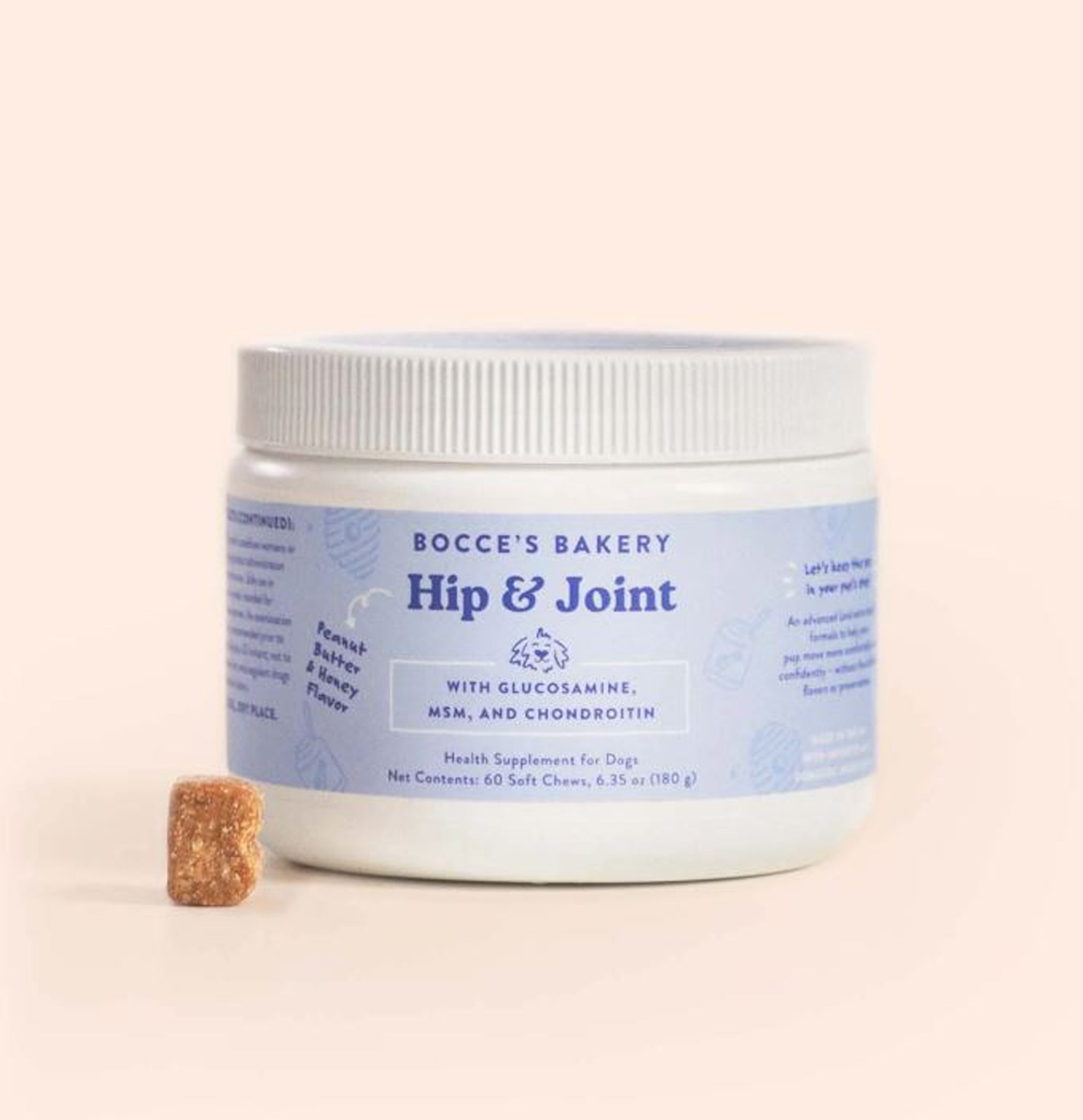 Bocce's Bakery Hip & Joint dog supplement jar with chew piece beside it