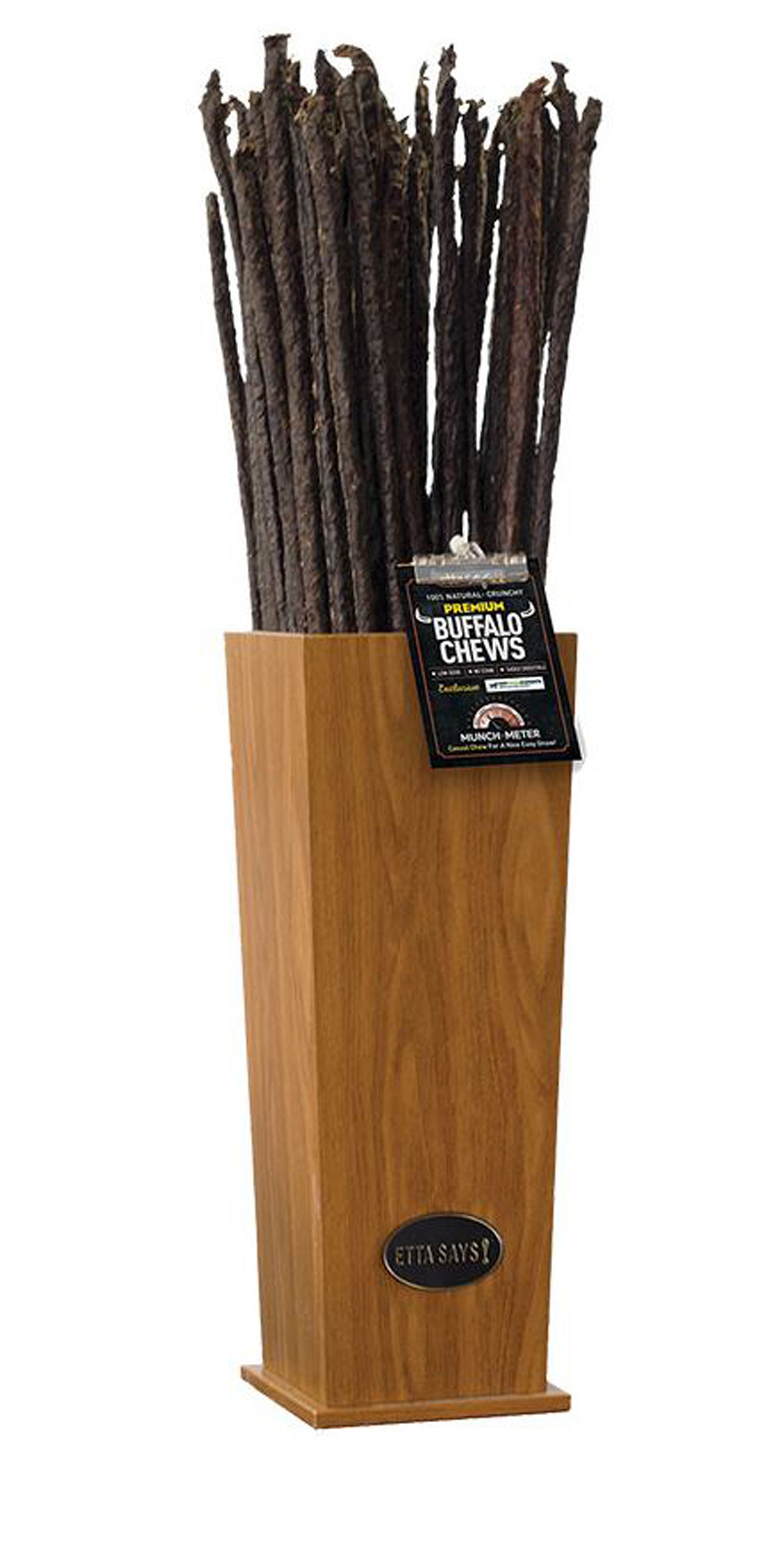 Wooden dog chew display with bundled crunchy buffalo sticks and brand label