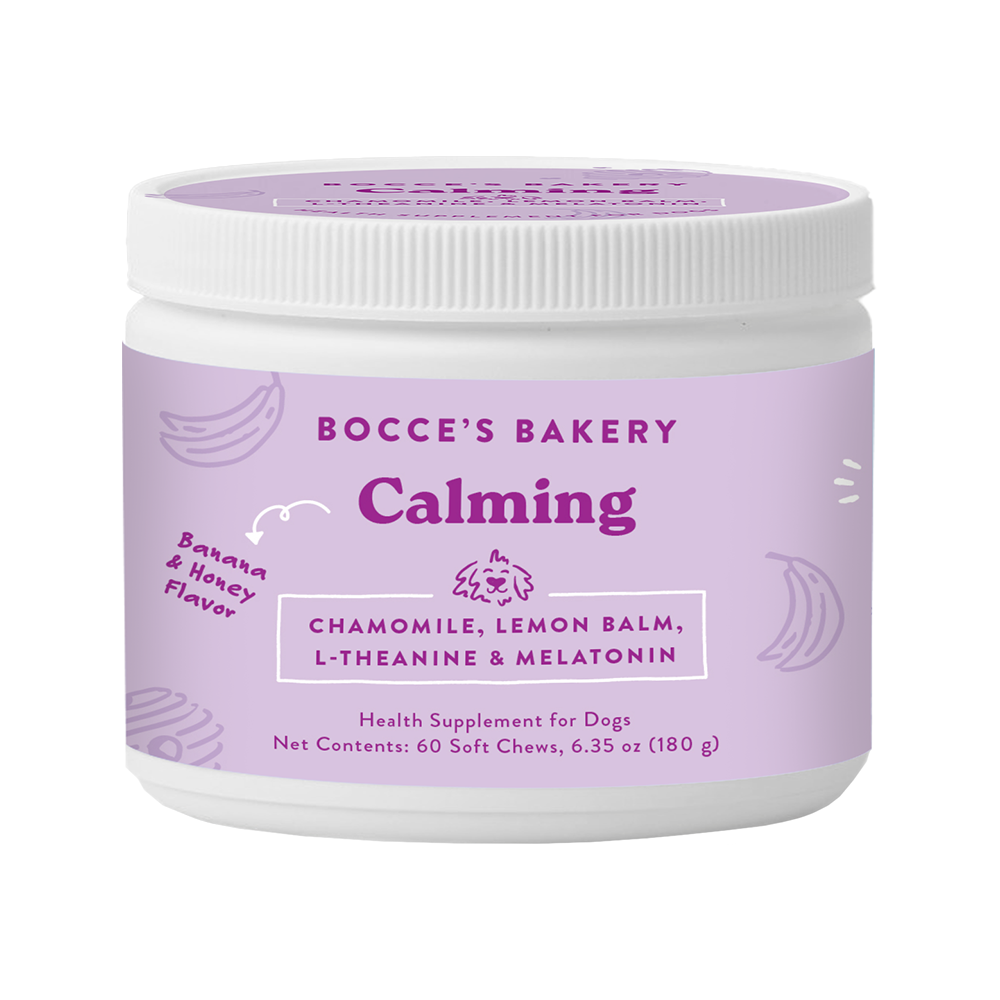 Calming dog supplement jar with purple label and white ribbed screw-top lid